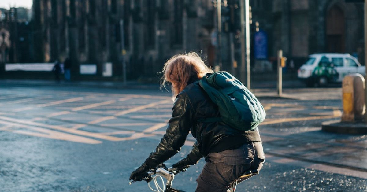 "Cyclist studying cash conversion cycle charts and formulas."